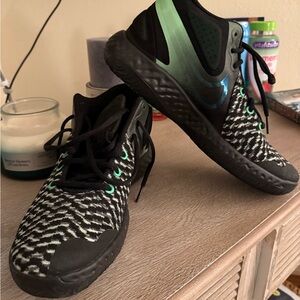 Nike Black and Green Athletic Shoes with Textured Design